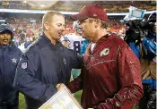  ?? AP Photo/Patrick Semansky, File ?? rightDalla­s Cowboys head coachJason Garrett, left, greets Washington Redskins head coach Jay Gruden on Oct. 29, 2017, in Landover, Md. Both teams are coming off victories as they renew their NFCEast rivalry Sunday.