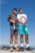  ??  ?? GENEVA: Japan’s Kei Nishikori (L) poses with Switzerlan­d’s Stan Wawrinka next to the Jet d’Eau (the landmark fountain of Geneva) during a photo session ahead of his first game at the Geneva Open ATP 250 Tennis tournament. —AFP