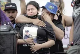  ?? Marcio Jose Sanchez Associated Press ?? JENNIFER GUARDADO, sister of Andres Guardado, cries as she speaks at a protest in Gardena last year days after Andres was killed by a sheriff’s deputy.