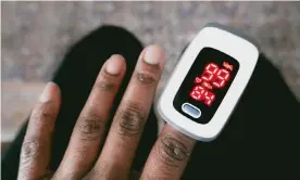  ?? Photograph: Grace Cary/Getty Images ?? Some research suggest that oximeters work less well for patients with darker skin.