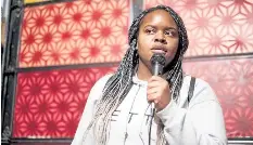  ?? Courtesy photo ?? Comic Shanel Hughes, pictured performing at the Denver Comedy Lounge, will perform in Boulder for the festival.