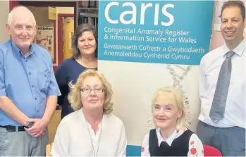  ??  ?? From left, the Caris team – Vivian Morgan, Linda Bailey, Helen Jenkins, Margery Morgan and David Tucker, who work with pregnant mums.
