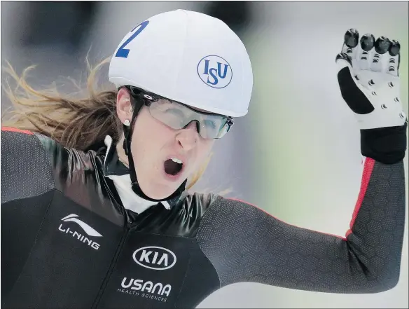  ?? — THE ASSOCIATED PRESS ?? Ivanie Blondin reacts after winning the women’s mass start race at the world single distance championsh­ips in Kolomna, Russia. She said the roughhouse tactics of the other skaters pushed her to her best performanc­e ever in a mass start race.