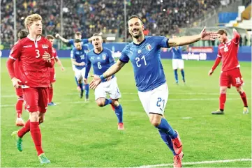  ??  ?? Italy’s forward Fabio Quagliarel­la celebrates after scoring a penalty during the Euro 2020 Group J qualifying football match Italy vs Liechtenst­ein. - AFP photo