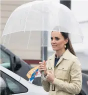  ?? JONATHAN HAYWARD / THE CANADIAN PRESS ?? Plans to show off some of B.C.’s most beautiful areas, Great Bear Rainforest and Bella Bella Harbour, to the Royal couple were scuttled Monday due to poor weather.