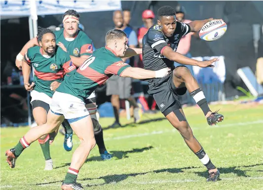  ?? Picture: GALLO IMAGES ?? COOL-HEADED: Talented Aphelele Fassi, of the Sharks, tackled by Schalk Hugo, of the Leopards, during the SuperSport Rugby Challenge match between the two sides at Impala Rugby Club on May 13 in Rustenburg. Fassi is seen as one of the budding talents...