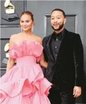  ?? AMY SUSSMAN/GETTY ?? Chrissy Teigen and her husband, John Legend, seen April 3, are expecting another child.