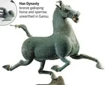 ??  ?? Han Dynasty bronze galloping horse and sparrow, unearthed in Gansu.