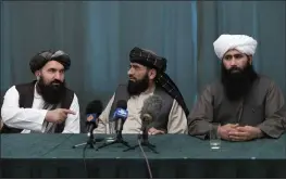  ?? ALEXANDER ZEMLIANICH­ENKO — THE ASSOCIATED PRESS ?? Members of the Taliban from the left, Khairullah Khairkhwa, Suhail Shaheen and Mohammad Naeem attend a joint news conference in Moscow on Friday.