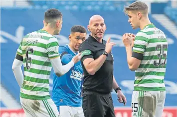  ??  ?? Nir Bitton pleads his case to Bobby Madden, but it was to no avail