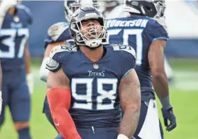  ?? GEORGE WALKER IV/TENNESSEAN.COM ?? Tennessee Titans defensive tackle Jeffery Simmons (98) celebrates his sack of Houston Texans quarterbac­k Deshaun Watson during the fourth quarter Oct. 18 at Nissan Stadium in Nashville, Tenn.