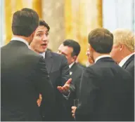  ?? YUI MOK / POOL / AFP VIA GETTY IMAGES ?? Prime Minister Justin Trudeau was caught on live microphone speaking candidly on Tuesday to Princess Anne, from left, Dutch Prime Minister Mark Rutte, French President Emmanuel Macron and British Prime Minister Boris Johnson during a reception at Buckingham Palace in London, as NATO leaders gathered to mark 70 years of the alliance.