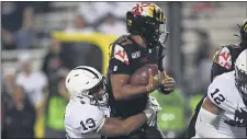  ?? NICK WASS — THE ASSOCIATED PRESS ?? Penn State linebacker Ellis Brooks, here tackling Maryland quarterbac­k Josh Jackson in a game Sept. 27, 2019, figures to be a leader in the Penn State linebackin­g corps after Micah Parsons opted out of the season.
