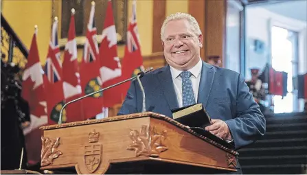  ?? MARK BLINCH THE CANADIAN PRESS ?? Doug Ford speaks as he is sworn in as premier of Ontario during a ceremony at Queen’s Park in Toronto on Friday.