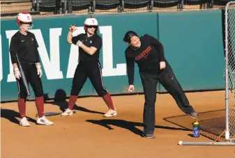  ?? Michael Macor / The Chronicle ?? New Stanford softball coach Jessica Allister conducts practice last week. After a 2-4 start, her team has won four of five, including a no-hitter thrown by Kiana Pancino on Sunday.