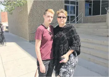  ?? ASHLEY MARTIN ?? Stephanie Gartel, with her mother Michele Dietzmann at the Regina courthouse Monday, was a victim of Robert Acrossthem­ountain, who was sentenced to four-and-a-half years for armed robbery.