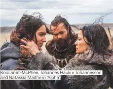  ??  ?? Kodi Smit-McPhee, Johannes Haukur Johannesso­n and Natassia Maithe in ‘Alpha’.