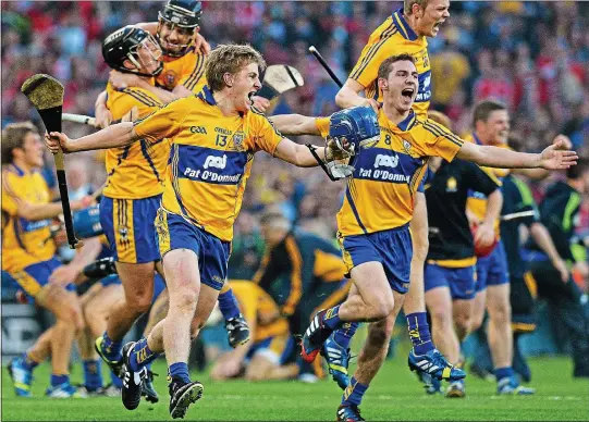  ??  ?? GLORY DAYS: Clare celebrate their 2013 AllIreland success (avove), something new management duo Donal Moloney (below, left) and Gerry O’Connor will try to recreate