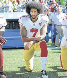  ?? AP ?? San Francisco 49ers' Colin Kaepernick kneels during the US national anthem before an NFL game.