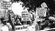  ??  ?? Drivers protest against Ola and Uber in New Delhi last month