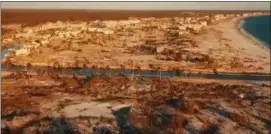  ?? ASSOCIATED PRESS ?? Drone aerial video from Mexico Beach, Florida shows a stretch of the town with almost every structure no longer standing. There was just one confirmed death so far in Mexico Beach, which Hurricane Michael nearly wiped off the map. (Oct. 16)