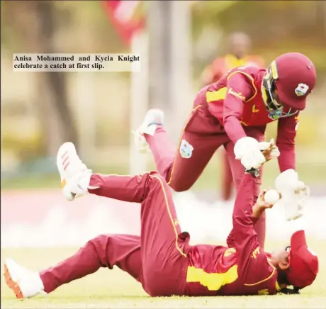  ??  ?? Anisa Mohammed and Kycia Knight celebrate a catch at first slip.