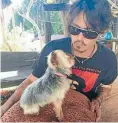  ??  ?? Johnny Depp with one of the dogs.