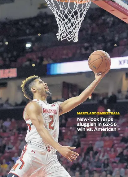  ?? GAIL BURTON/ASSOCIATED PRESS ?? Maryland’s Melo Trimble scores inside against American during the first half of the Terps’ season opener in College Park. Trimble, a junior, led Maryland with 22 points, but the team struggled with turnovers in its only game before facing Georgetown on...