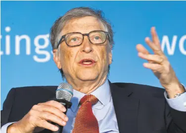  ?? Jose Luis Magana / Associated Press ?? Bill Gates and his wife, Melinda, will direct grants to groups working directly with public school districts.