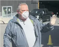  ?? RENÉ JOHNSTON TORONTO STAR ?? Premier Doug Ford said he wears a mask when he is out in public and cannot keep a safe distance from others.