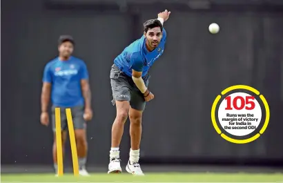  ??  ?? Runs was the margin of victory for India in the second ODI India’s Bhuvneshwa­r Kumar during a training session at the Sir Vivian Richards Cricket Ground in Antigua on Wednesday. —