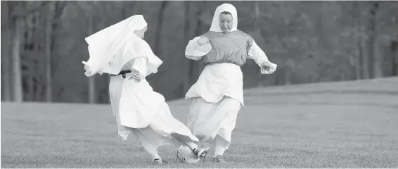  ??  ?? Sisters play soccer at the Dominican Sisters of Mary, Mother of the Eucharist campus outisde Ann Arbor, Michigan.