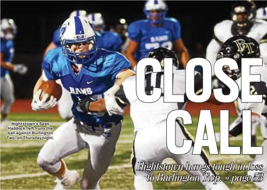  ?? GREGG SLABODA — TRENTONIAN PHOTO ?? Hightstown’s Sean Haddock, left, runs the ball against Burlington Twp. on Thursday night.