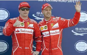  ??  ?? Doppietta Raikkonen e Vettel salutano i tifosi; sopra, il finlandese in azione (Colombo, LaPresse)