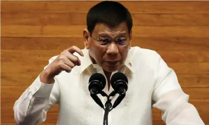  ??  ?? Rodrigo Duterte gestures as he delivers his sixth state of the nation address in Quezon City, Metro Manila, in July. Photograph: Lisa Marie David/Reuters