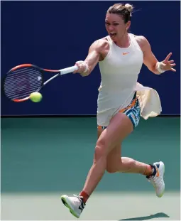  ?? (Reuters) ?? WORLD NO. 1 Simona Halep of Romania hits a return to Estonian Kaia Kanepi during her shock 6-2, 6-4 defeat yesterday in the first round of the US Open.