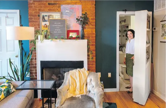  ?? PHOTOS: BILL O’LEARY/THE WASHINGTON POST ?? In a small space, a doorway can take up a lot of otherwise usable wall space for books or art. With the help of her father, Nicole Buell built a secret door that opens to a bathroom in her condo. Now, she says she uses it to surprise her guests.