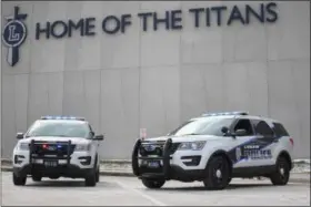  ?? ERIC BONZAR—THE MORNING JOURNAL ?? On March 12, Lorain police came to Lorain High School to show their Titan pride. The department has added six new vehicles to its fleet, including two Ford Explorers designated for road patrol, with a new color scheme. The department chose to forego...