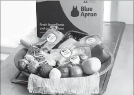  ?? Matthew Mead Associated Press ?? BLUE APRON, which has been hemorrhagi­ng customers in recent years, hasn’t made a profit since its 2017 IPO. Above, an example of a home-delivered meal.