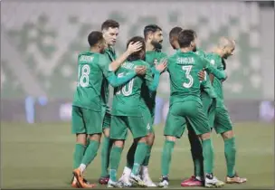  ?? ?? Al Ahli players celebrate one of Soufiane Hanni’s (right) two goals during their QNB Stars League match against Umm Salal at the Hamad Bin Khalifa Stadium on Sunday.