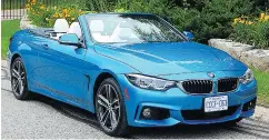  ?? BRIAN HARPER / DRIVING. CA ?? The Snapper Rocks Blue metallic paint on the 2018 BMW 440i xDrive Cabriolet garnered much praise.