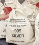  ??  ?? Everyone’s scrambling to get the Silver Vault Bags each loaded with 10 solid .999 pure Silver State Bars before they are all gone. That’s because the standard State Minimum set by the private Federated Mint dropped 42%, going from $50 per bar to just $29, which is a real steal. SILVER HITS ROCK BOTTOM: