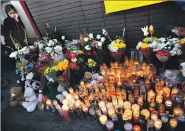  ?? Genaro Molina Los Angeles Times ?? PEDESTRIAN deaths in Los Angeles jumped to 134 last year from 74 in 2015. Above, a memorial for two boys killed by an SUV in Boyle Heights in November.