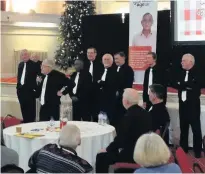  ?? From left, barbershop group Men in Black; the awards ceremony’s venue, Chorley town hall; and Ormskirk award winner David Ashton ??