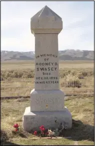  ??  ?? This gravestone in Mona marks the resting place of RD Swasey, whose four sons Charles, Sid, Rod and Joe explored the area of the San Rafael Swell and have many geographic­al locations there named after them.