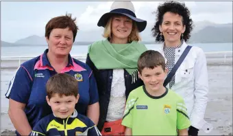  ??  ?? Edel Uí Chiobháin, Trish Ní Mhuirchear­taigh, Máire Furlong and her sons Dara and Cathal at Béal Bán Races on Sunday. Photo by Declan Malone