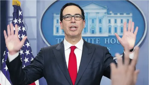  ?? ALEX WONG / GETTY IMAGES ?? U. S. Treasury Secretary Steven Mnuchin said he was “100-per- cent confident” that the debt ceiling would be raised in September. “There is no scenario where the government won’t be paying its bills,” he said.