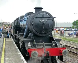  ??  ?? NoLMS8Fswe­re allocatedt­oaSouthern­Region shed in thedaysof steam, but they didwork through on freight fromtime to time. No. 48151 is seen atWeymouth­onJuly 9, 2011, withthe 3.10pmtoWate­rloo, whichthe Carnforth- based 2- 8- 0workedas far as Yeovil Junction. DONBENN