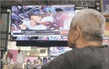  ?? DOUG DURAN - STAFF ?? Dave Gonzalez of Stockton, at Silver’s Bar in Linden, watches Aaron Judge bat during the All-Star Game. Judge was born and raised in the tiny San Joaquin County community and often returns to visit his hometown.