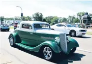  ??  ?? From classics to exotics, custom show cars to hot rods, there is never a dull moment along the 16-mile Dream Cruise route.